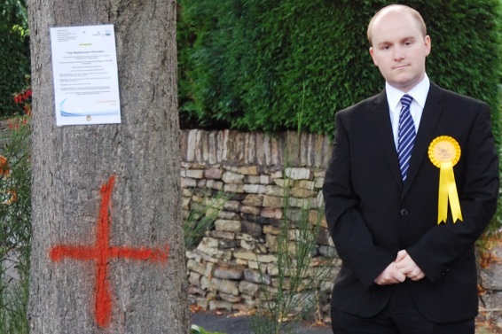 Local campaigner Richard Shaw and one of the trees marked for removal on Folds Lane